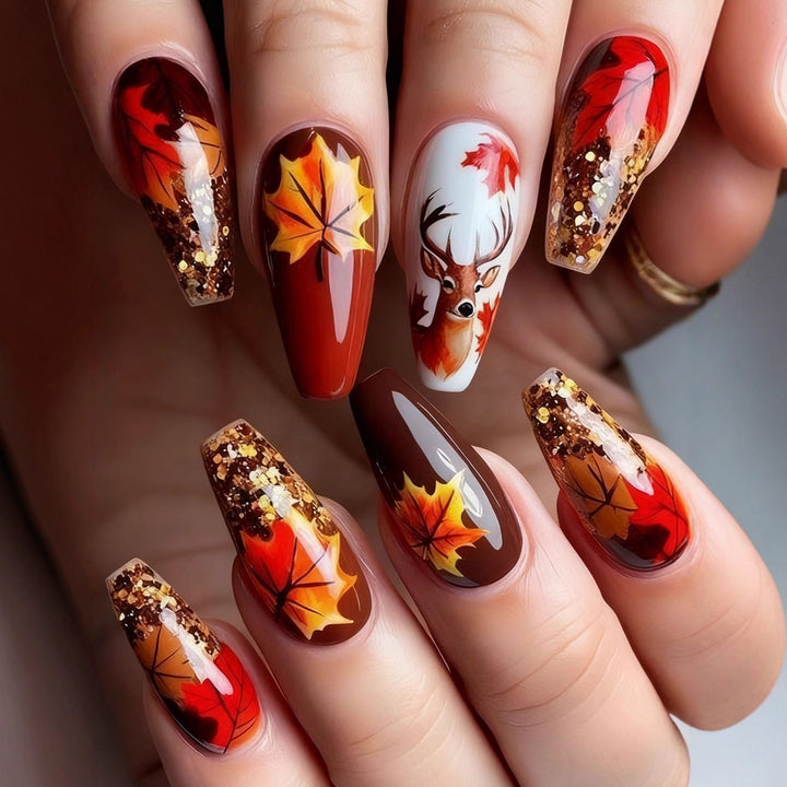 Artificial nail art with autumn leaf design Kalsten