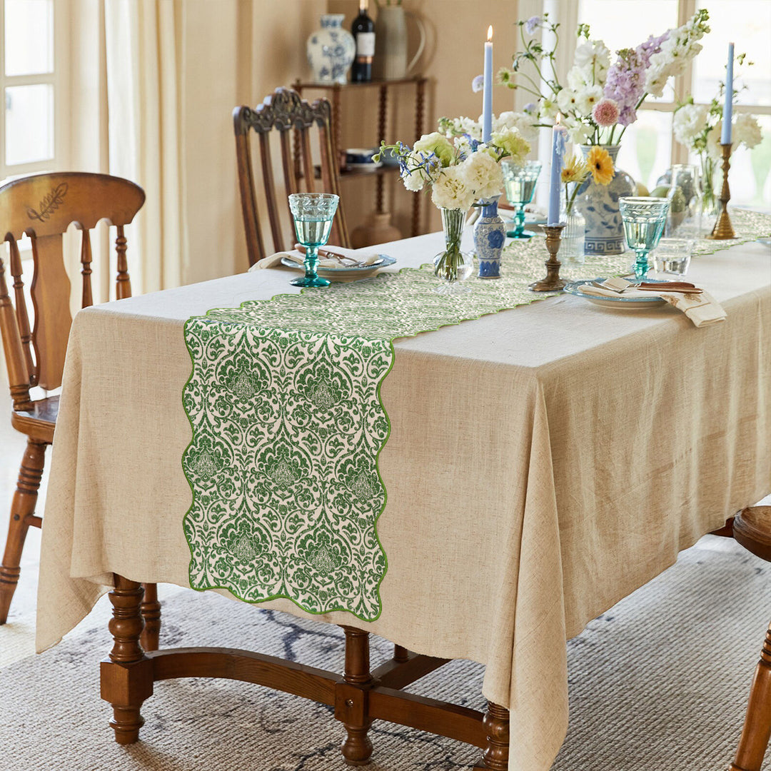 Damask-style table runner with curved wave edge and fine ornamental print Kalsten