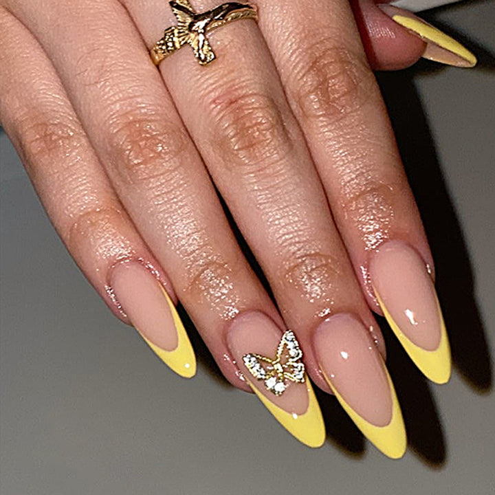 Artful stiletto nails with glamorous butterfly design Kalsten