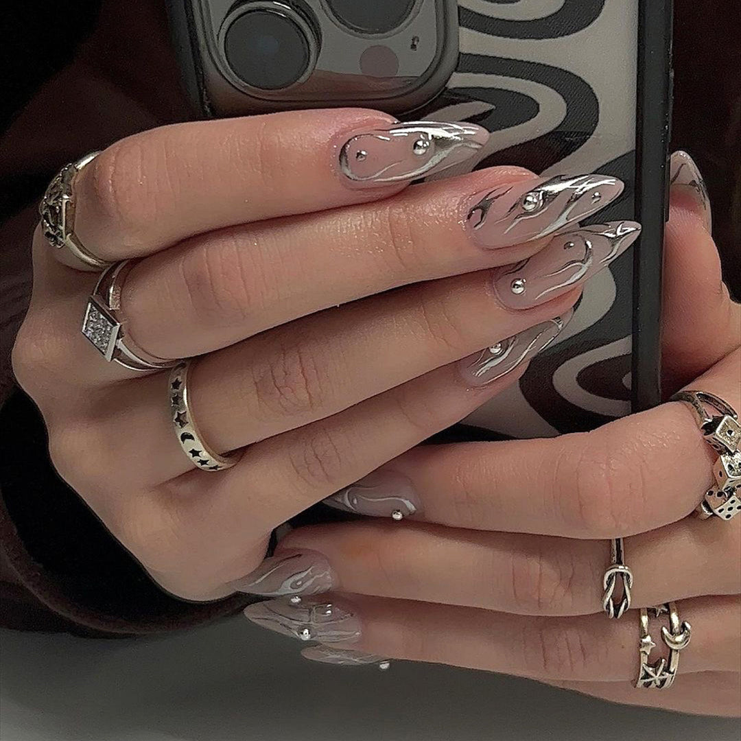 Nail set with elegant water drop design and 3D accents Kalsten