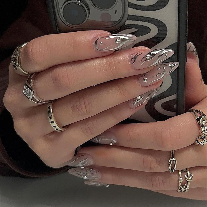 Nail set with elegant water drop design and 3D accents Kalsten