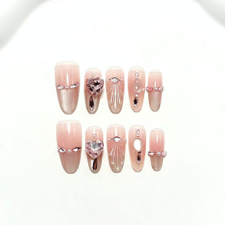 Artificial nails with sparkling heart and rhinestone accents Kalsten