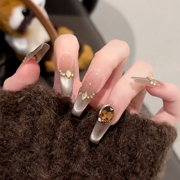 Elegant Press-On Nail Design with Rhinestone Accents Kalsten