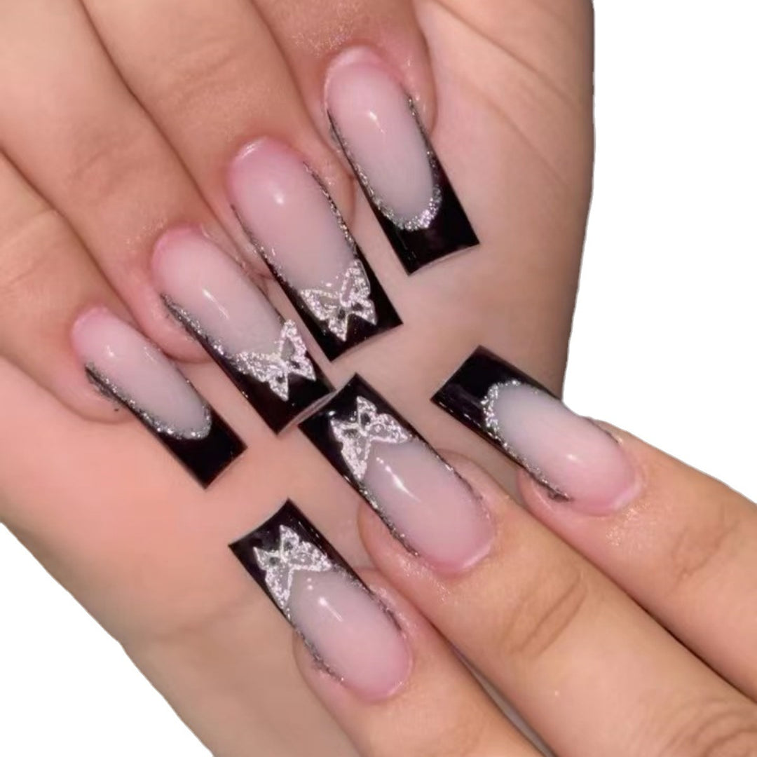 Glamorous Stiletto Nail Extensions with Butterfly Accents Kalsten