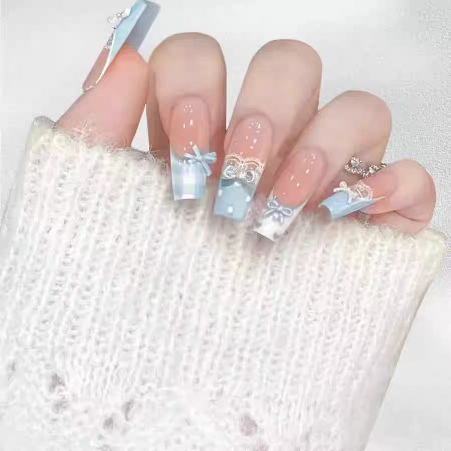 Artistic Press-On Nail Extensions with Floral Embellishments Kalsten