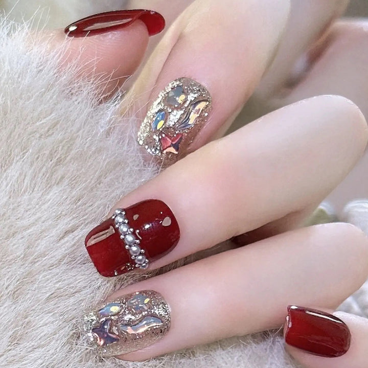 Glamorous artificial nail set with sparkling 3D applications and elegant embellishments Kalsten