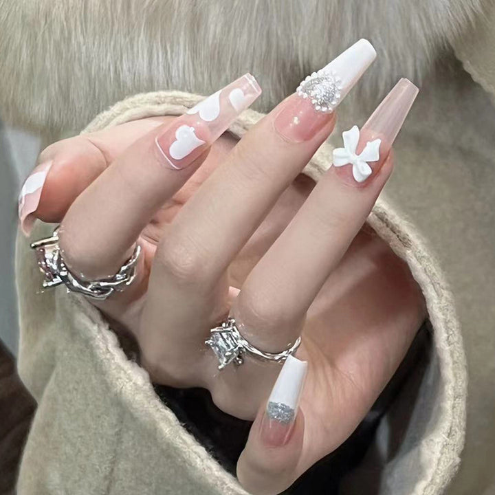 Artificial nail extensions with elegant floral design Kalsten