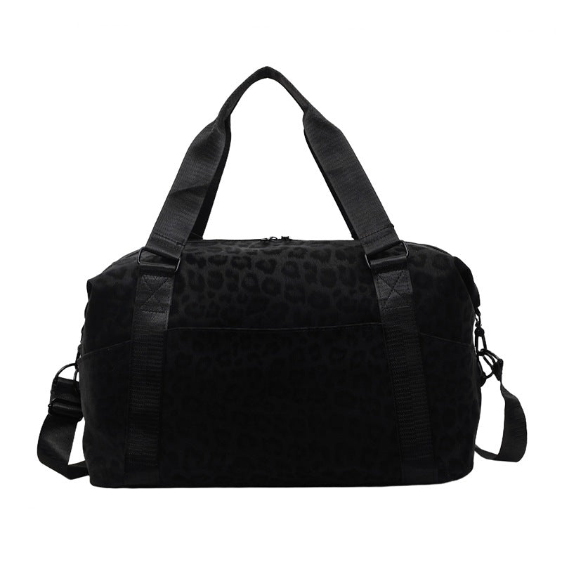 Sporty duffel bag with animal pattern and practical carrying options Kalsten