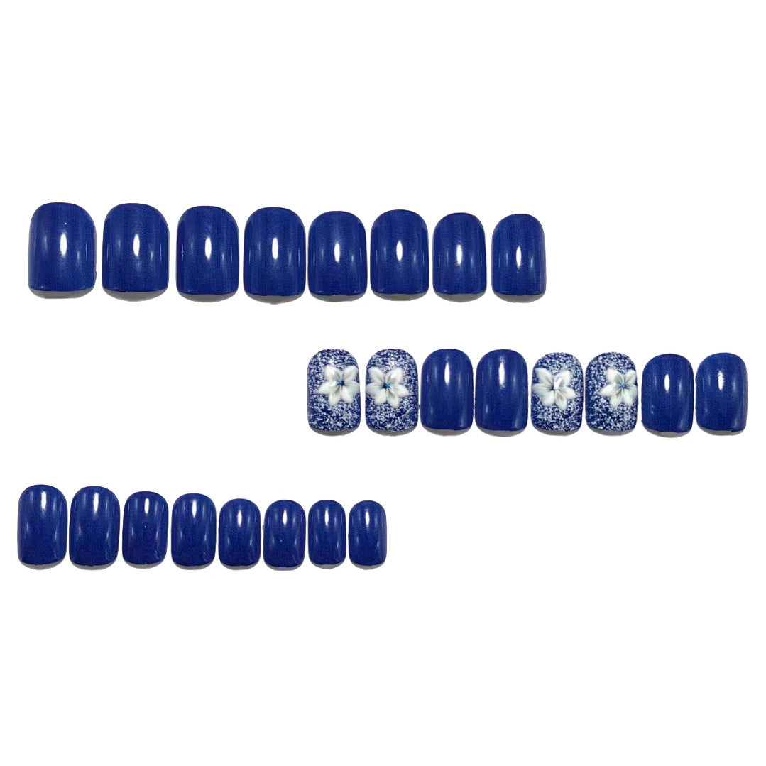 Artificial nails in elegant glitter design with floral embellishments Kalsten