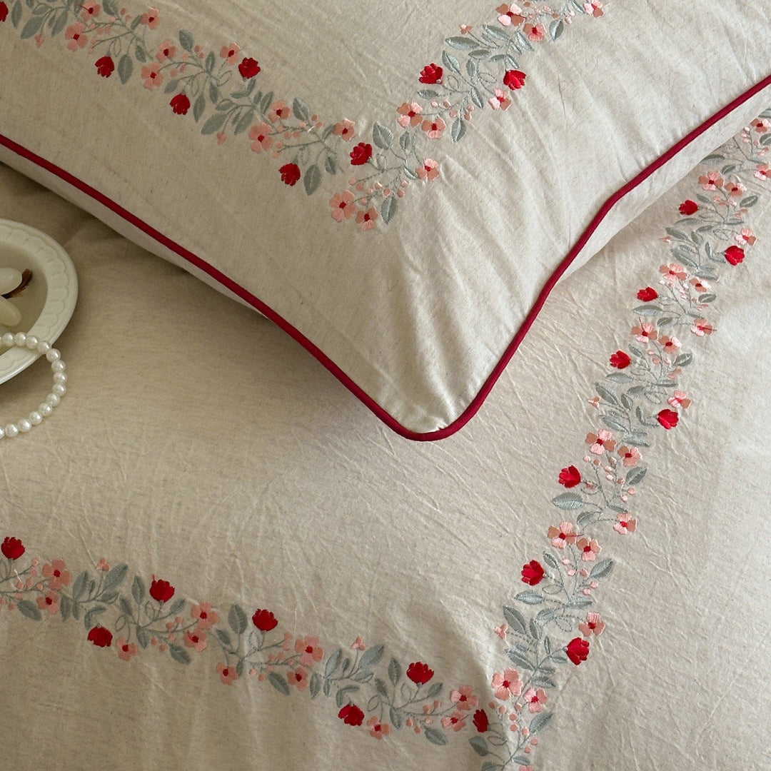 High-quality cotton-linen bed linen set with fine floral embroidery and piping edge