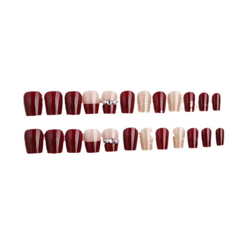Glamorous artificial nails with glitter and pearl decorations Kalsten
