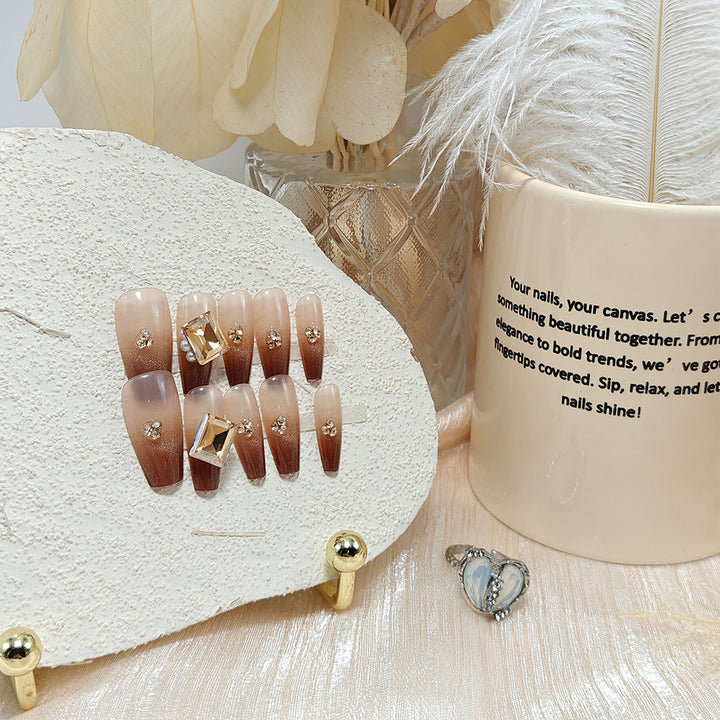 Artificial nails with elegant ombre effect and exquisite gemstones Kalsten