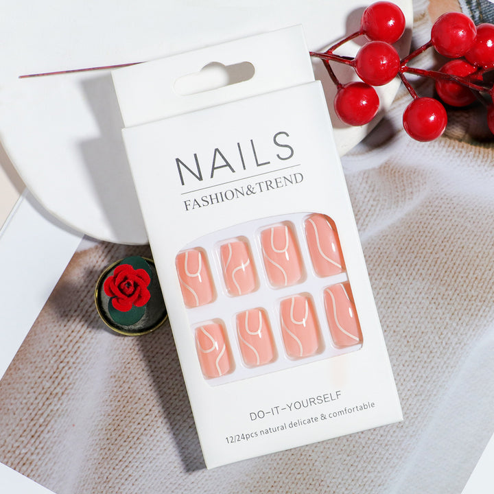 Elegant Press-On Nail Design with Artistic White Swirl Kalsten