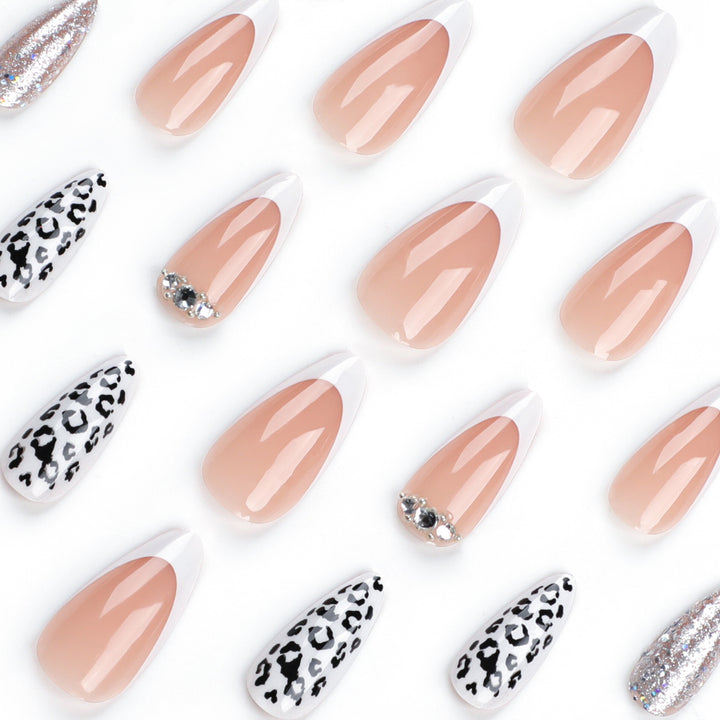 Artful stiletto nails with leopard patterns and glitter accents Kalsten