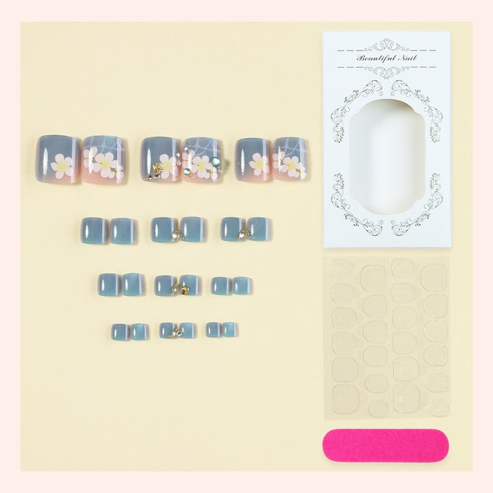 Artificial nail set with floral appliqués and glitter effects Kalsten