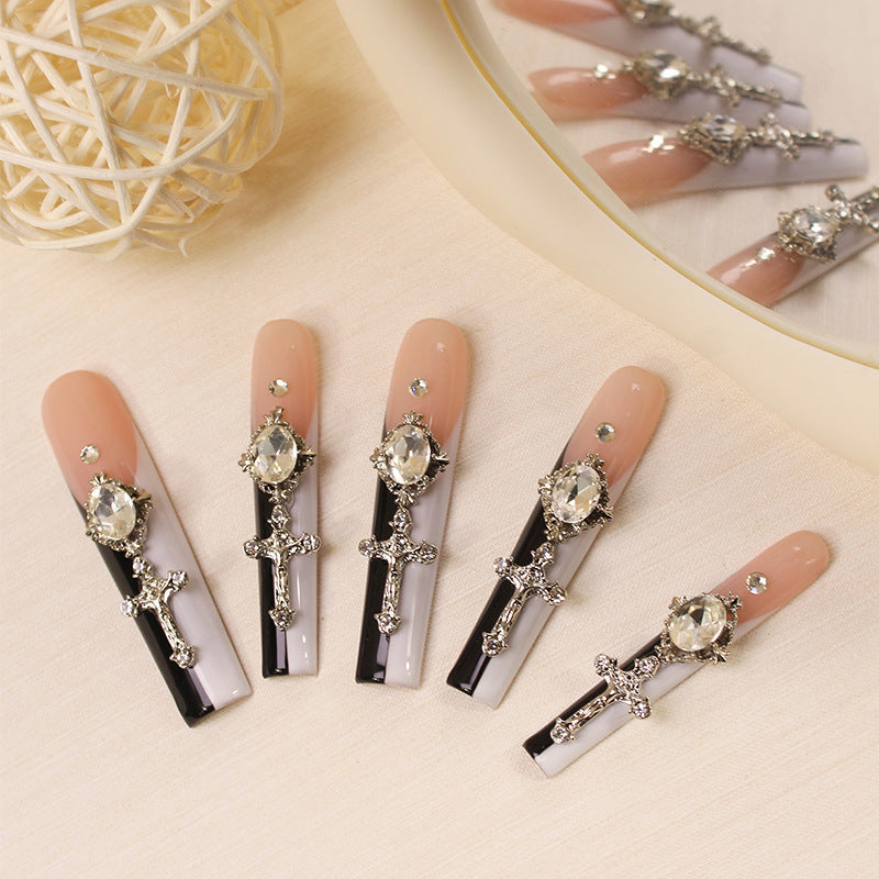 Glamorous artificial nails with elegant cross decorations Kalsten