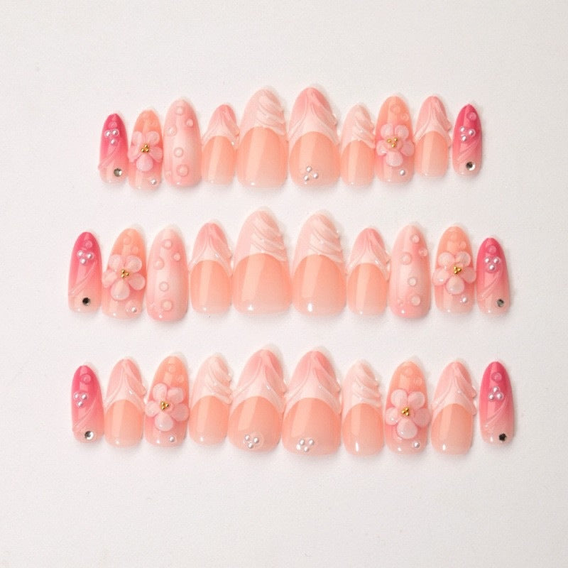 Artificial nail set with delicate floral and glitter accents Kalsten