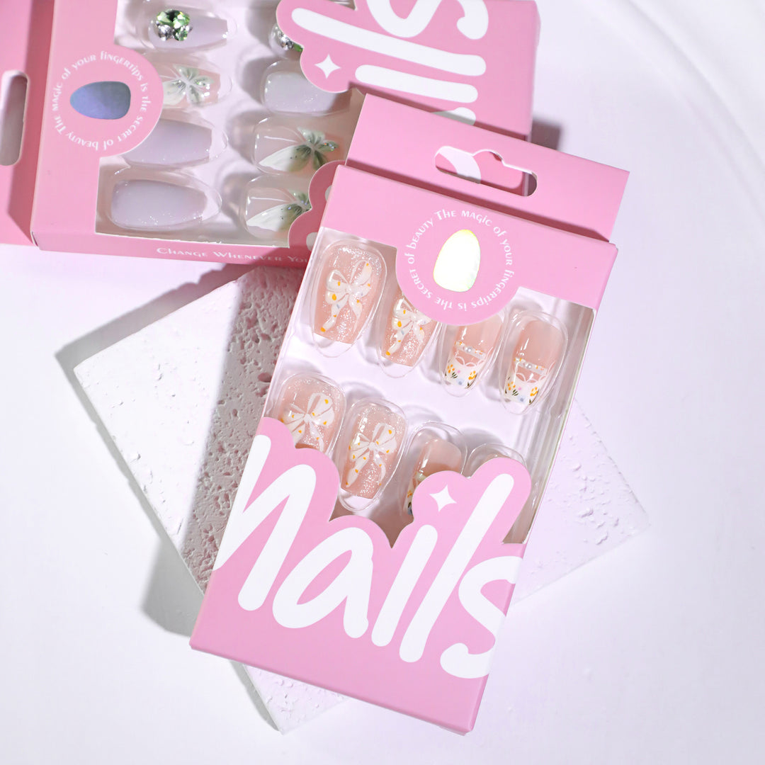 Artful Nail Extensions with Floral Design and Bow Accents Kalsten