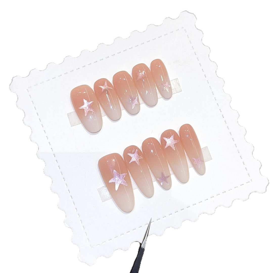 Artificial nails with sparkling stars and gentle gradient Kalsten