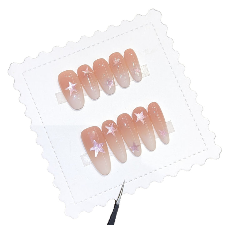 Artificial nails with sparkling stars and gentle gradient Kalsten