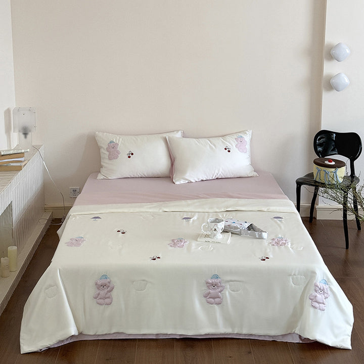 Satin bedding set with playful whale print and silky shiny surface