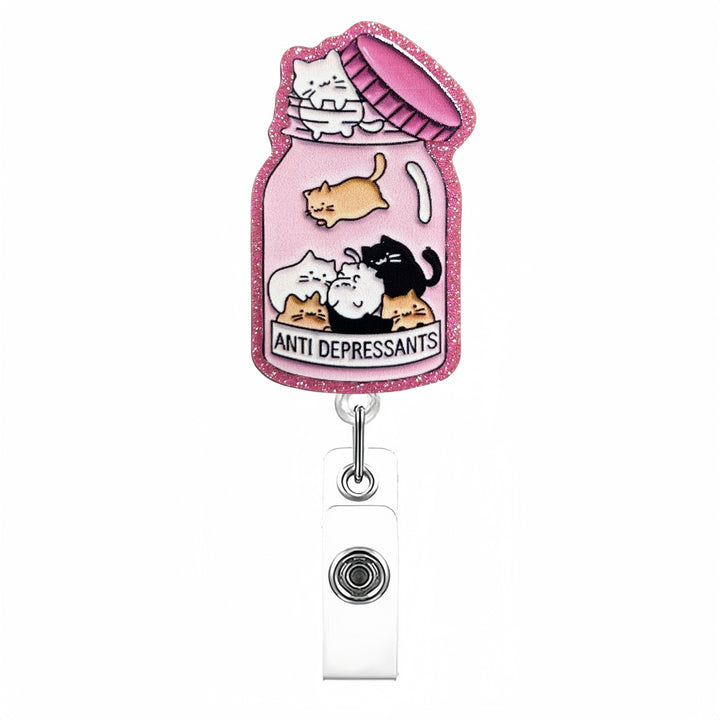 Expandable badge holder with anatomical heart pendant