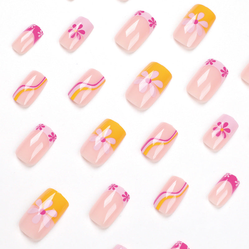 Creative Nail Art with Floral Design and Colorful Accents Kalsten
