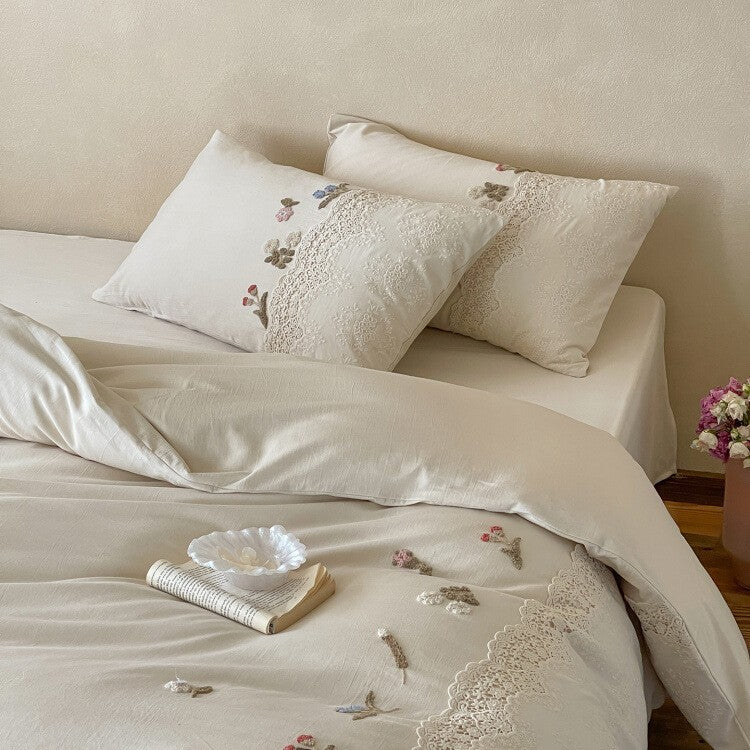 Embroidered cotton satin bedding set with lace trim
