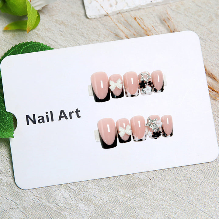Elegant artificial nails with detailed embellishments Kalsten