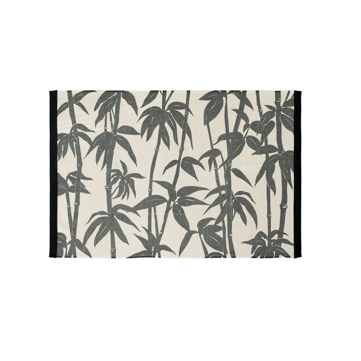 Woven table runner with floral vinyl print look and reinforced overlock stitching Kalsten
