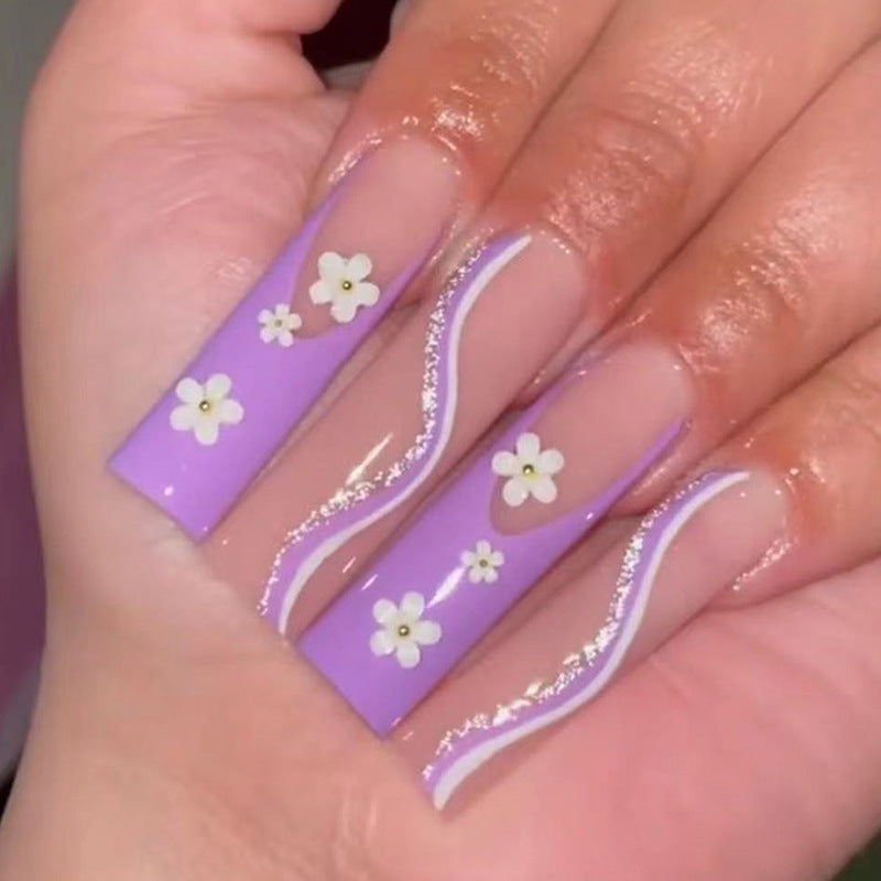 Creative nail art with floral accents Kalsten