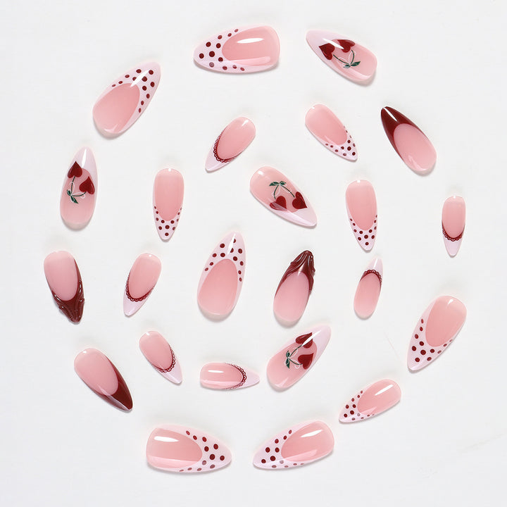 Creative nail art set with romantic heart design and playful accents Kalsten