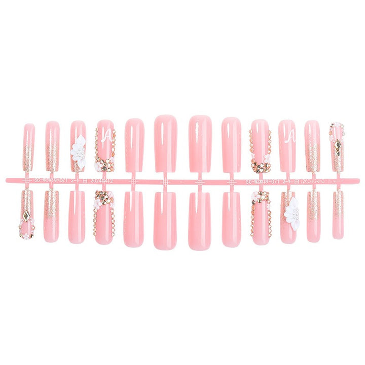 Creative acrylic nail set with delicate flower and gloss embellishments Kalsten
