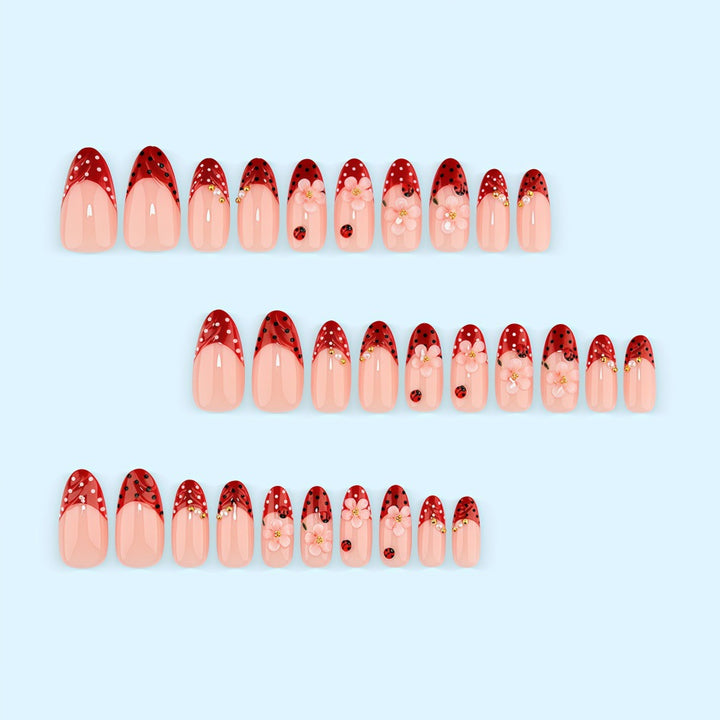 Creative tip design artificial nails with floral accents Kalsten