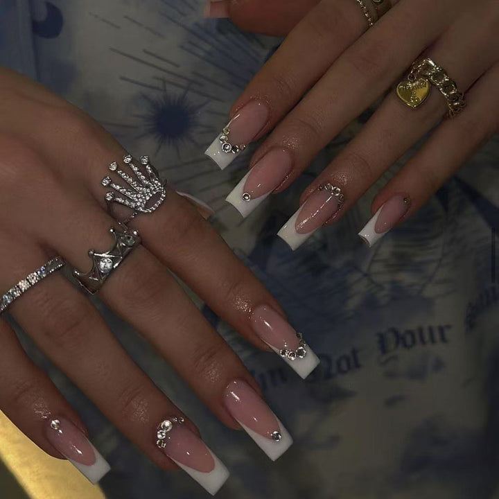 Acrylic nail set with elegant high-gloss finish and luxury rhinestone embellishments Kalsten