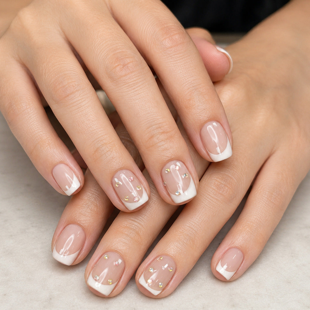 Elegant French Tip Nail Art Enhancements with Gem Accents Kalsten