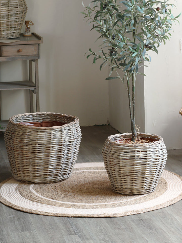 Stylish laundry basket made of braided natural material Kalsten