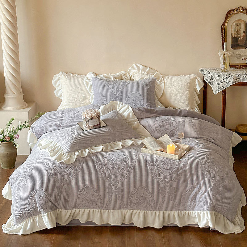 Ruffled quilted bedding set with jacquard medallion and ruffle