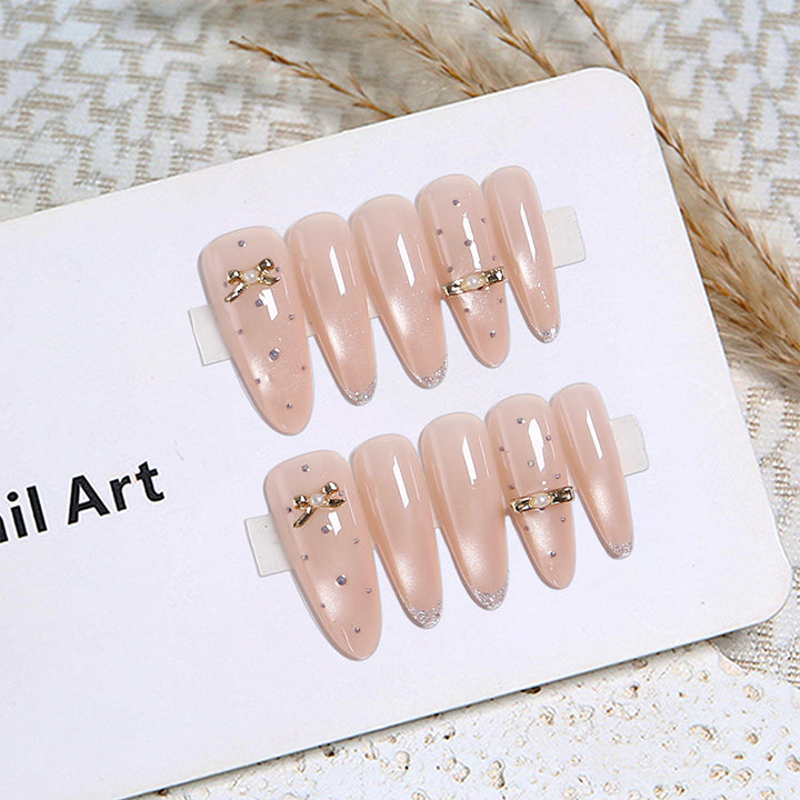 Acrylic nail set with elegant jewelry details Kalsten