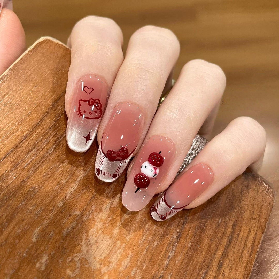 Artificial nails with playful Hello Kitty design Kalsten