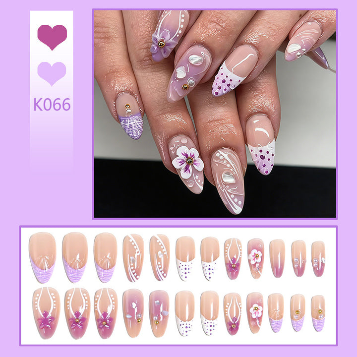 Artificial nail set with exotic floral and glitter accents Kalsten
