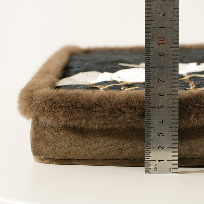 Padded seat cushion with velvet cover, floral embroidery and faux fur trim Kalsten