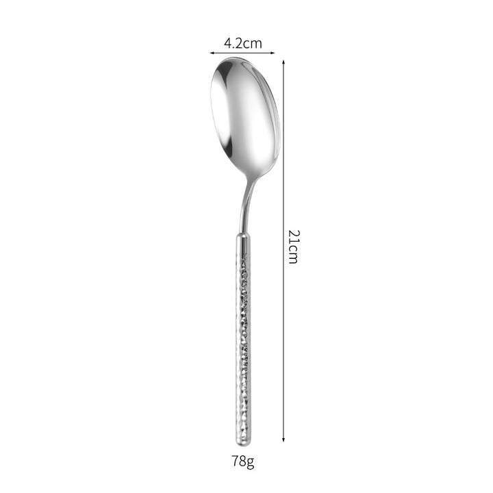 Elegant dessert spoon with elaborate handle design Kalsten