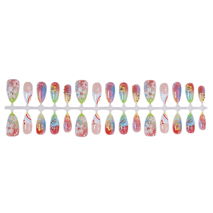 Artificial nail set with various designs and shiny embellishments Kalsten