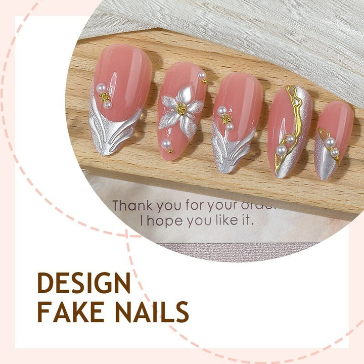 Artificial nail set with elegant silver tip design and floral accents Kalsten