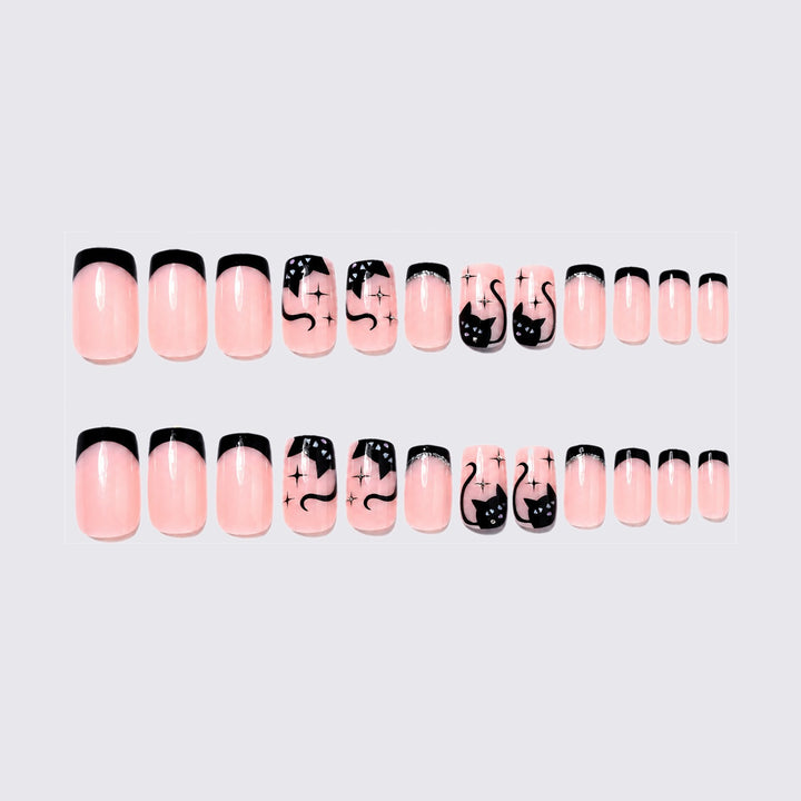Acrylic nail set with glamorous black designs and sparkling accents Kalsten