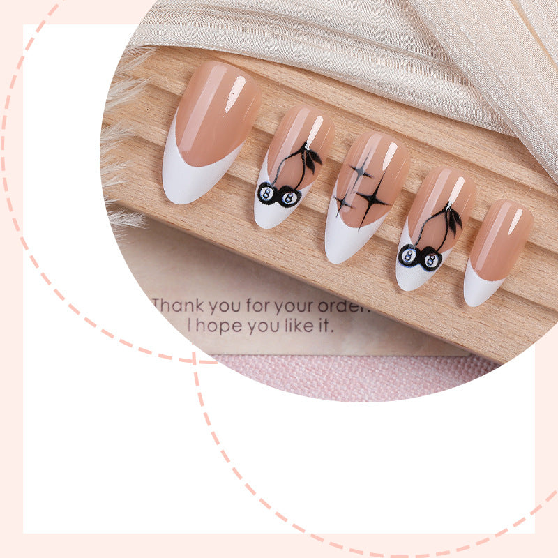 Creative nail art set with hand-drawn designs and French tips Kalsten