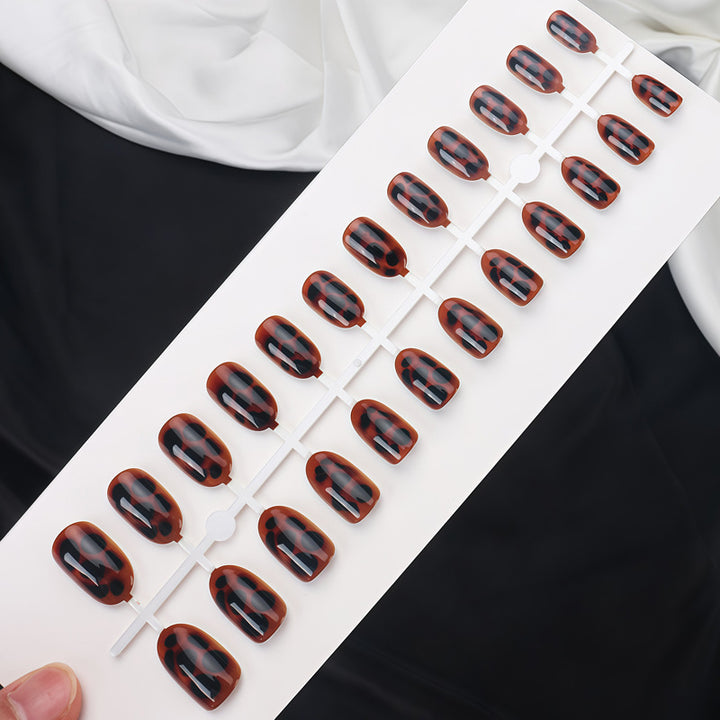 Glossy Stiletto Nail Tips with Leopard Print Design Kalsten