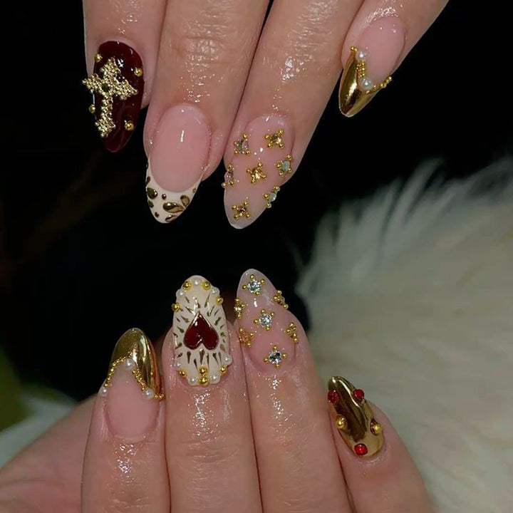 Artful nail art with rhinestone and gold accents Kalsten