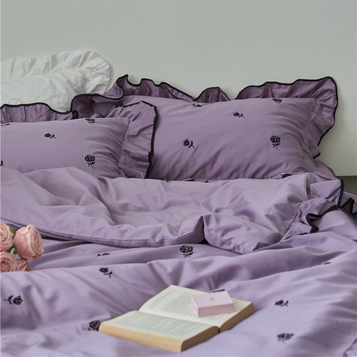 Bedding set with embroidered roses, ruffle details and extra soft cotton satin